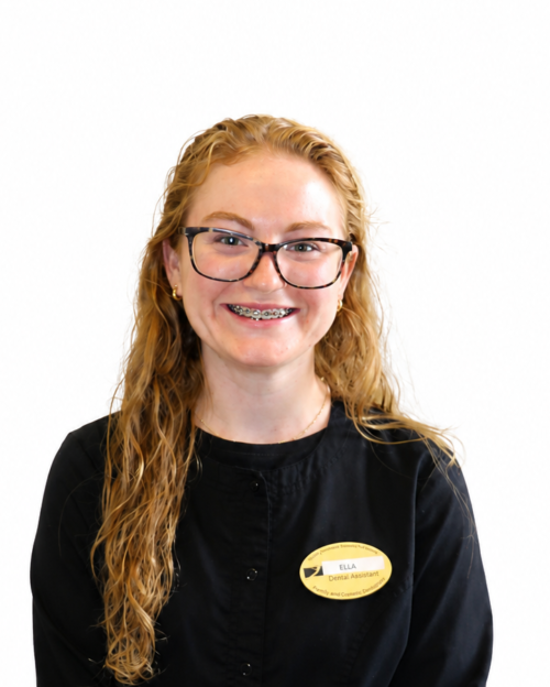 Photo of white woman with long hair and glasses in black jacket with nametag